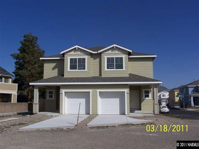 4501 Keyhaven Drive, Unit 42 Reno, NV 89502 - Photo 2 of 3 a front view of a house with a garage