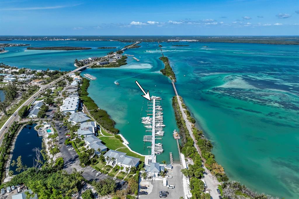 5820 Gasparilla Road, Unit SLIP 35 Boca Grande, FL 33921 - Photo 11 of 14 a view of a city with an ocean