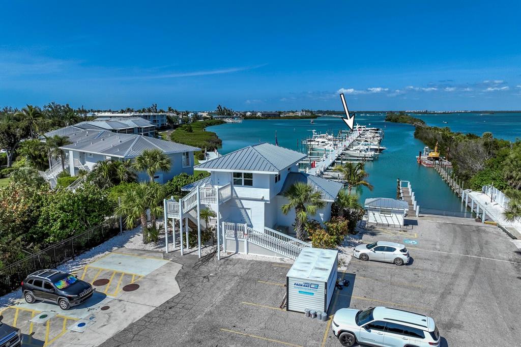 5820 Gasparilla Road, Unit SLIP 35 Boca Grande, FL 33921 - Photo 12 of 14 an aerial view of a house with a garden view