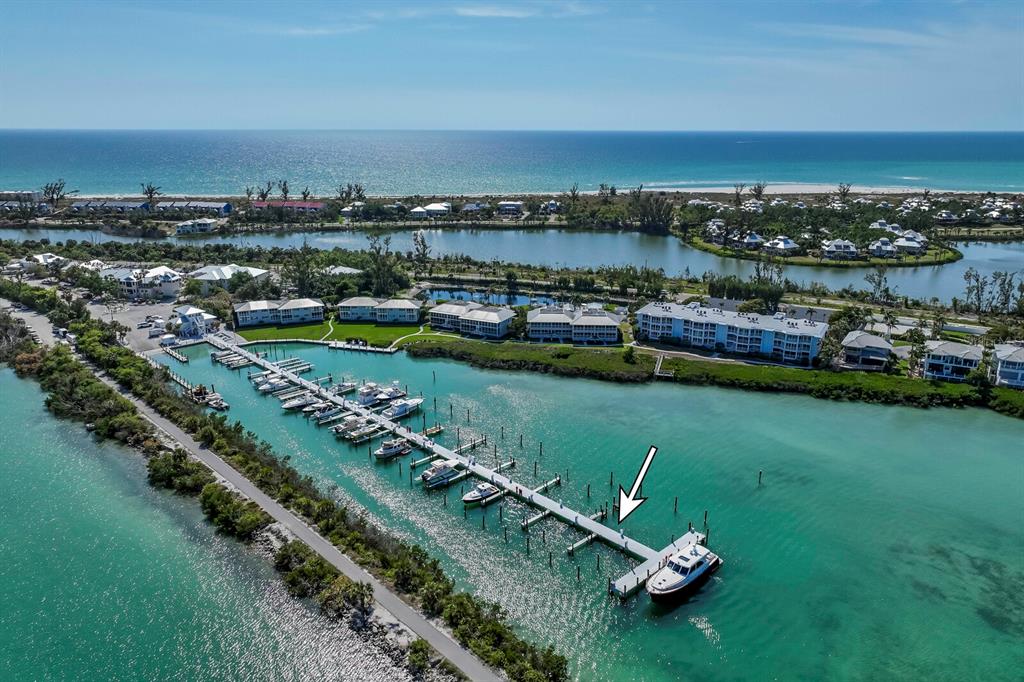 5820 Gasparilla Road, Unit SLIP 35 Boca Grande, FL 33921 - Photo 2 of 14 a view of a city with a lake