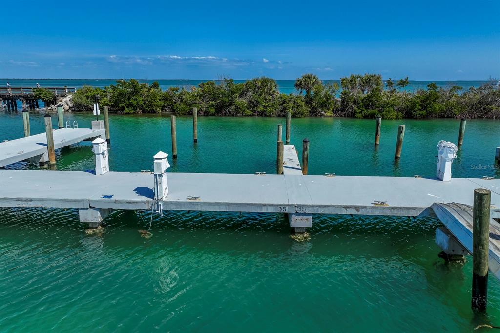 5820 Gasparilla Road, Unit SLIP 35 Boca Grande, FL 33921 - Photo 4 of 14 a view of a lake and outdoor space