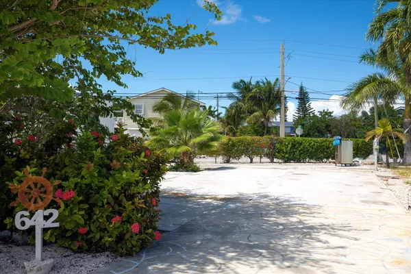 a view of a backyard of the house