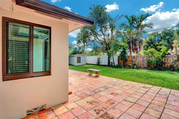 a backyard of a house with lots of green space