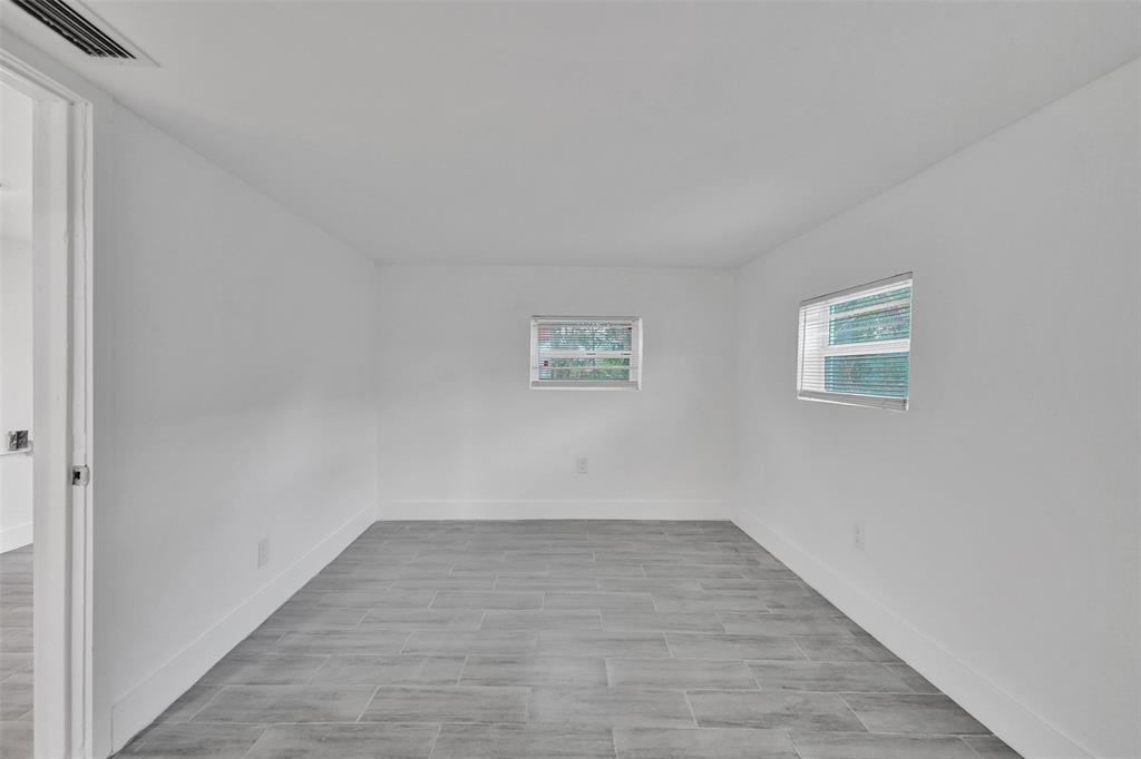 5025 Southwest 22nd Street Hollywood, FL 33023 - Photo 28 of 52 wooden floor in a empty room