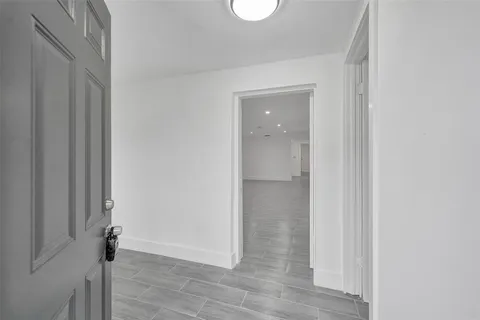 a view of a livingroom with wooden floor