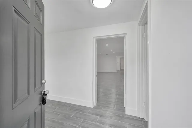 a view of a livingroom with wooden floor