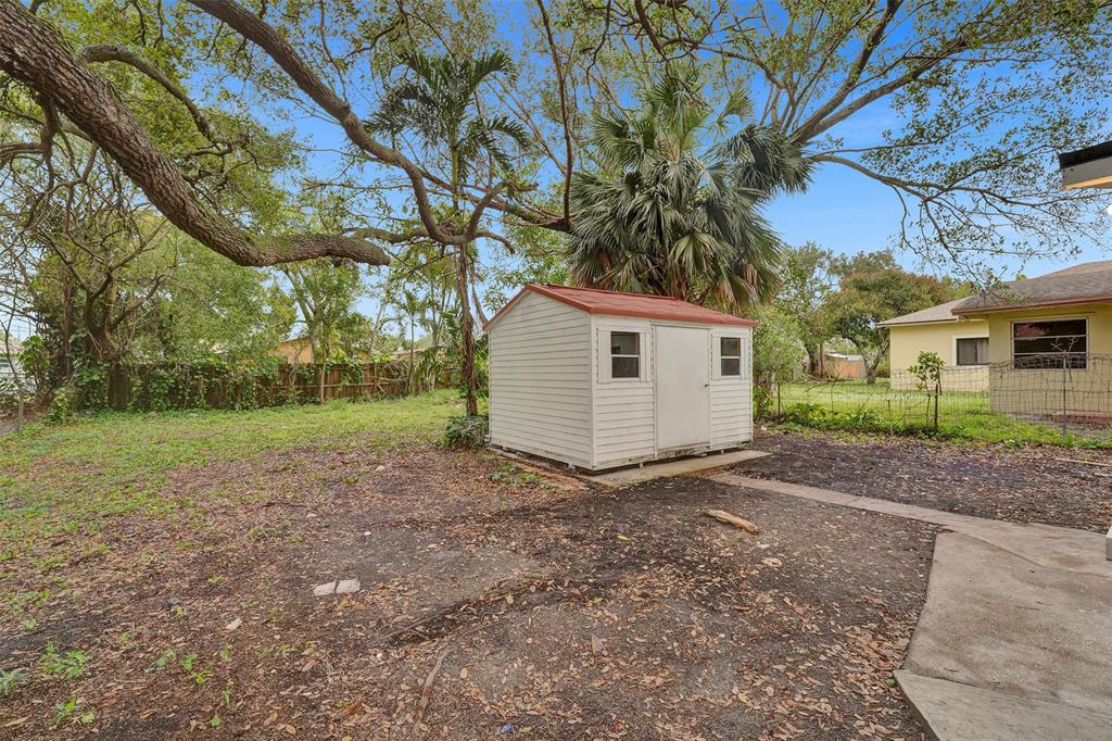 5025 Southwest 22nd Street Hollywood, FL 33023 - Photo 46 of 52 a view of a house with a yard