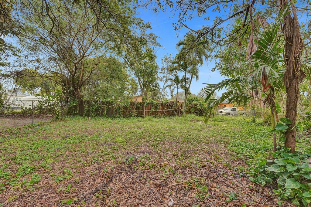 5025 Southwest 22nd Street Hollywood, FL 33023 - Photo 52 of 52 a view of outdoor space with deck and yard