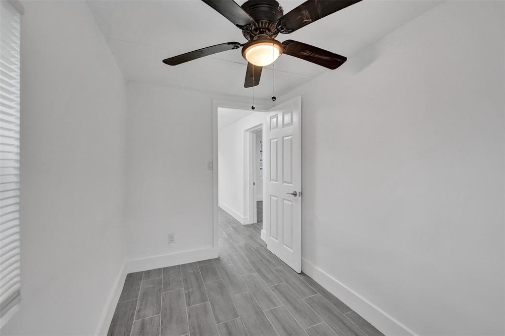 5025 Southwest 22nd Street Hollywood, FL 33023 - Photo 8 of 52 a view of a hallway with wooden floor