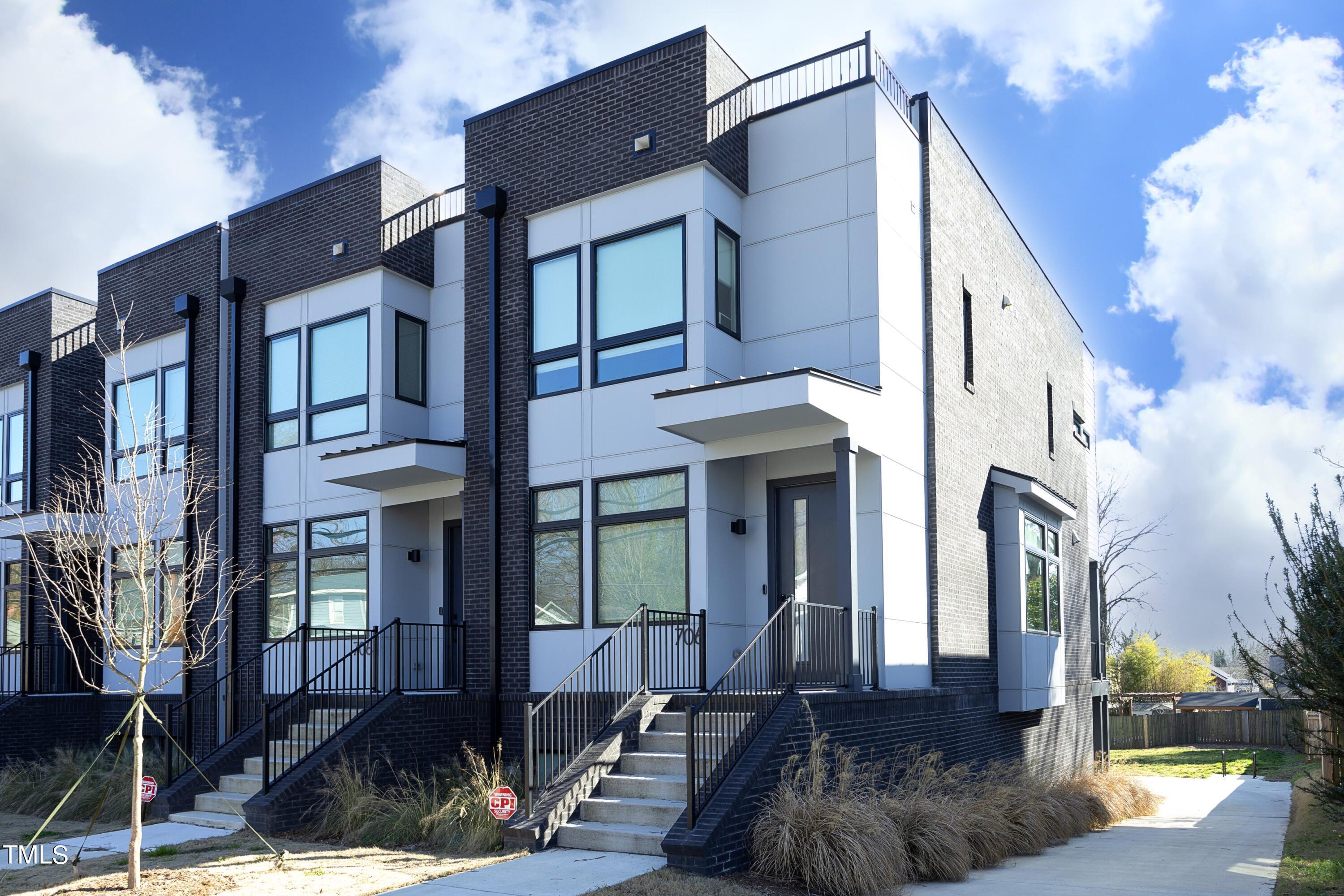 706 East Hargett Street Raleigh, NC 27601 - Photo 1 of 35 a front view of a house with street