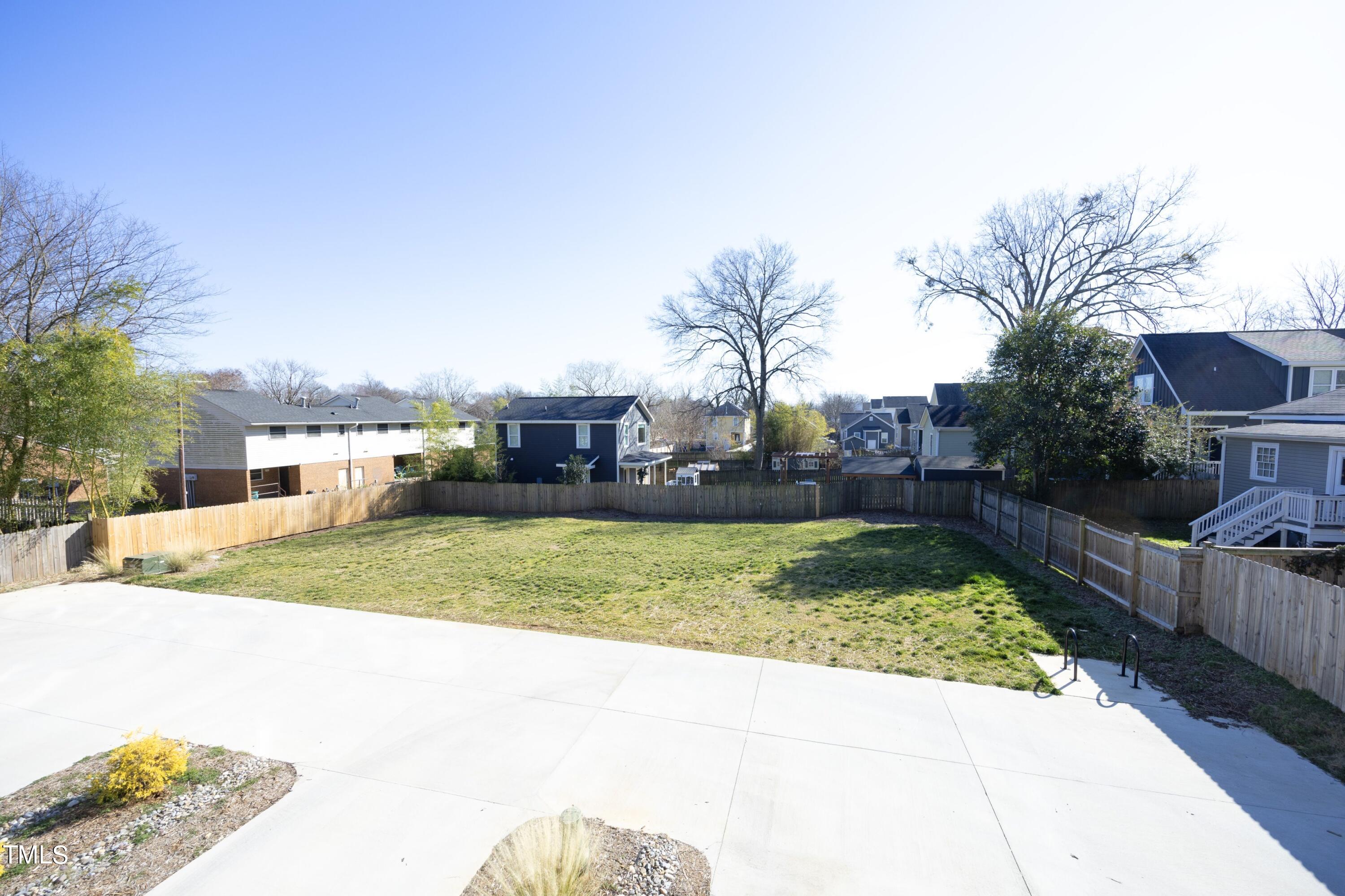 706 East Hargett Street Raleigh, NC 27601 - Photo 30 of 35 a view of backyard with swimming pool and seating space