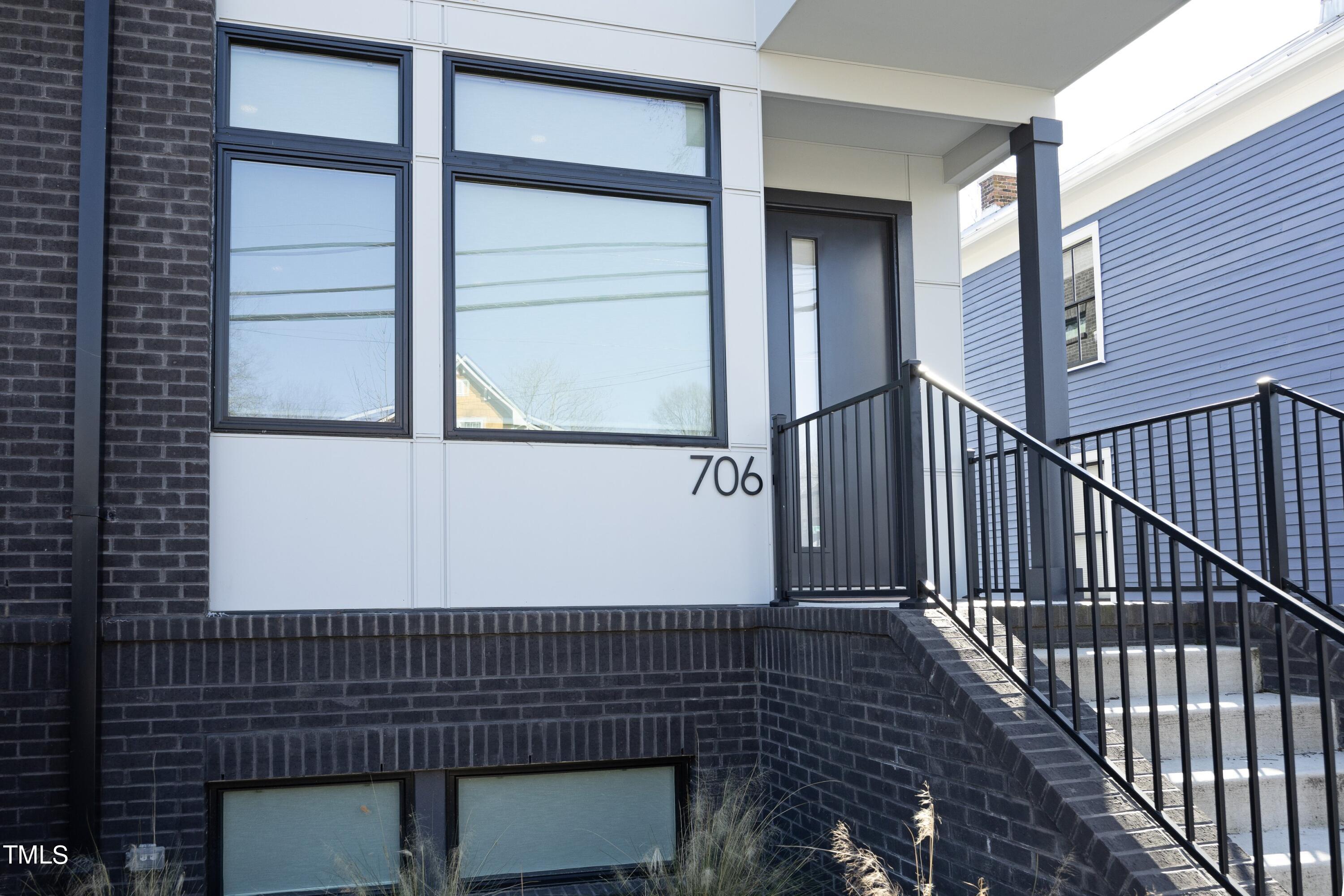 706 East Hargett Street Raleigh, NC 27601 - Photo 3 of 35 a view of a balcony with wooden floor