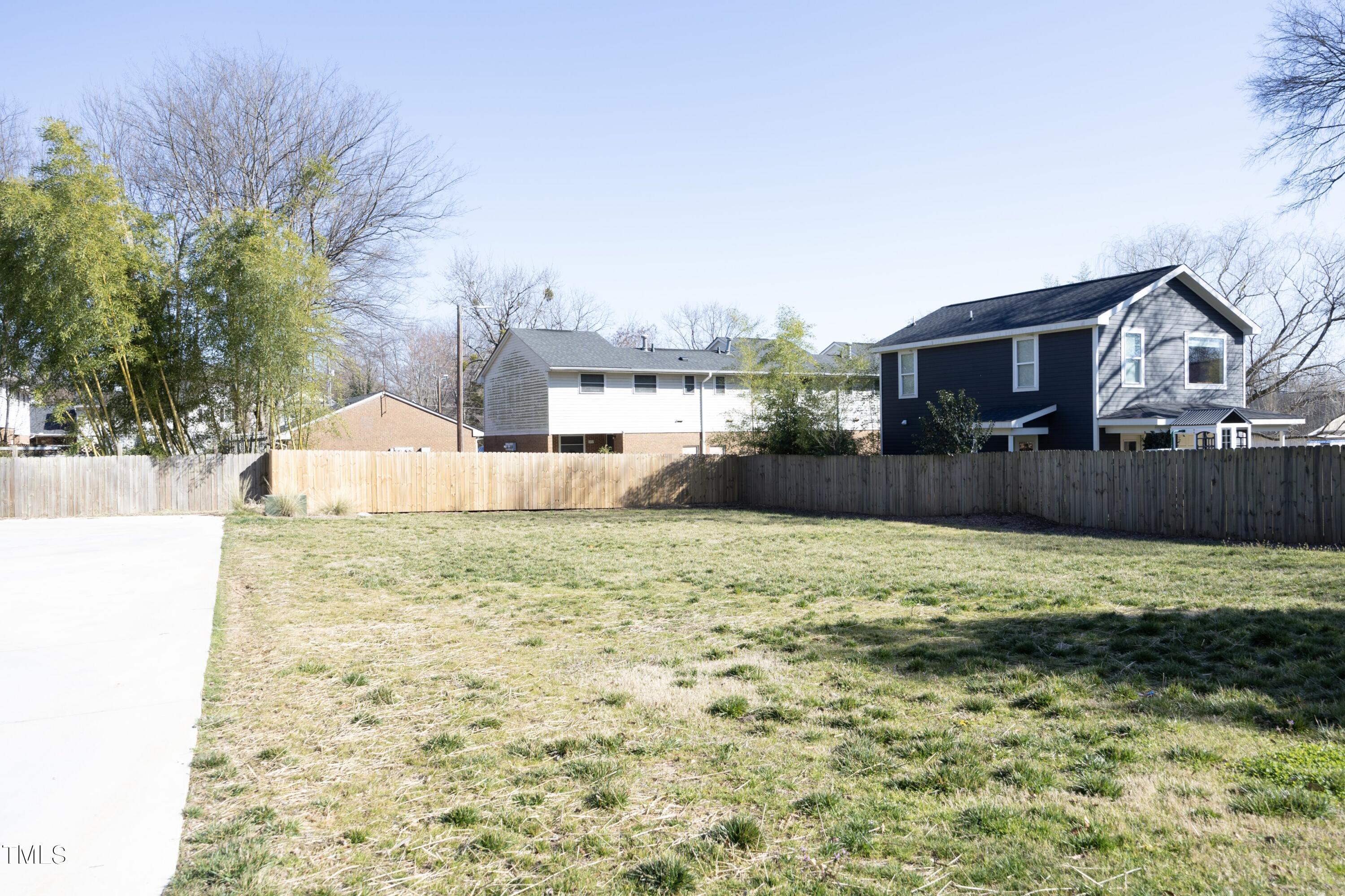 706 East Hargett Street Raleigh, NC 27601 - Photo 33 of 35 a view of a house with a yard