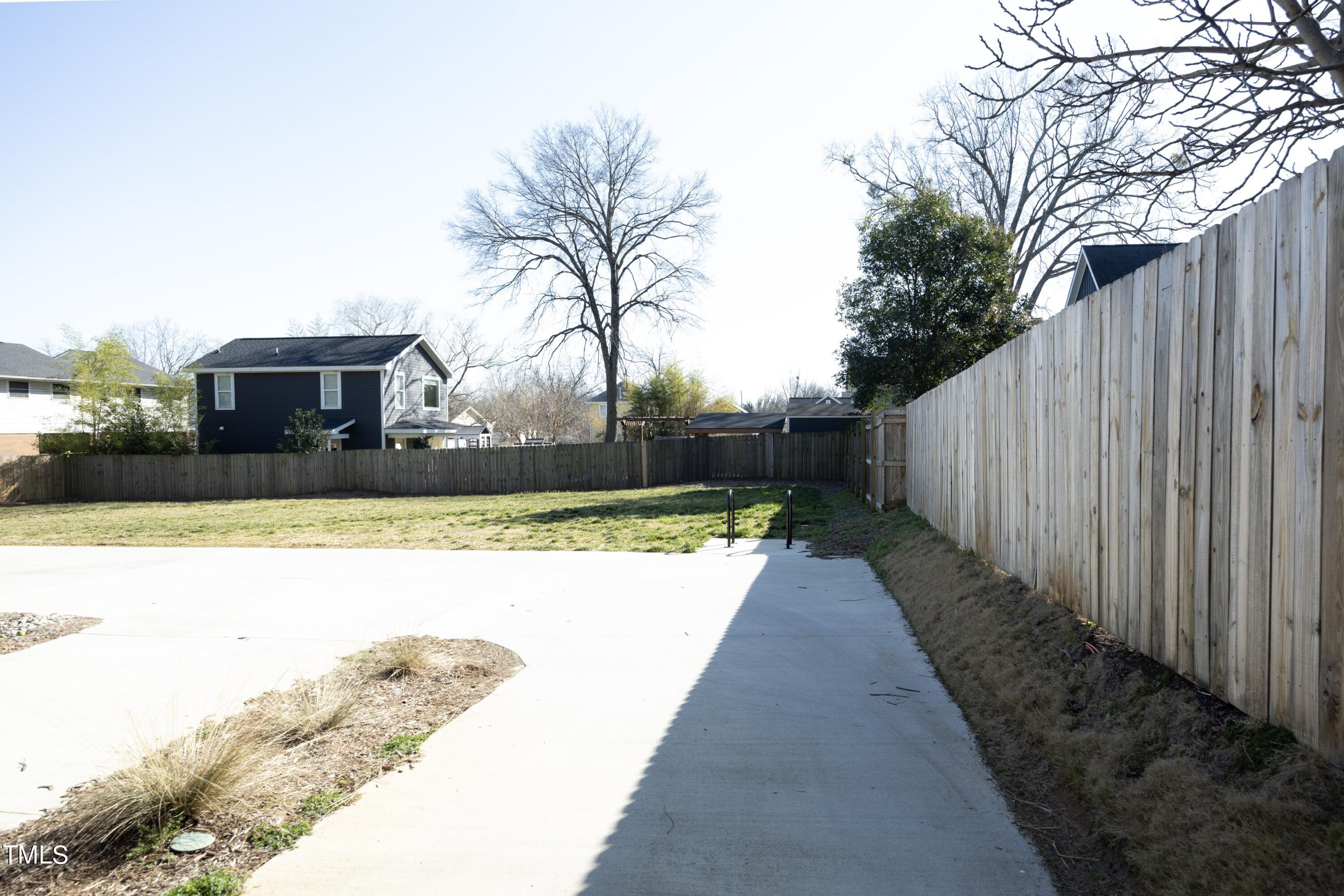 706 East Hargett Street Raleigh, NC 27601 - Photo 34 of 35 a view of a backyard with potted plants