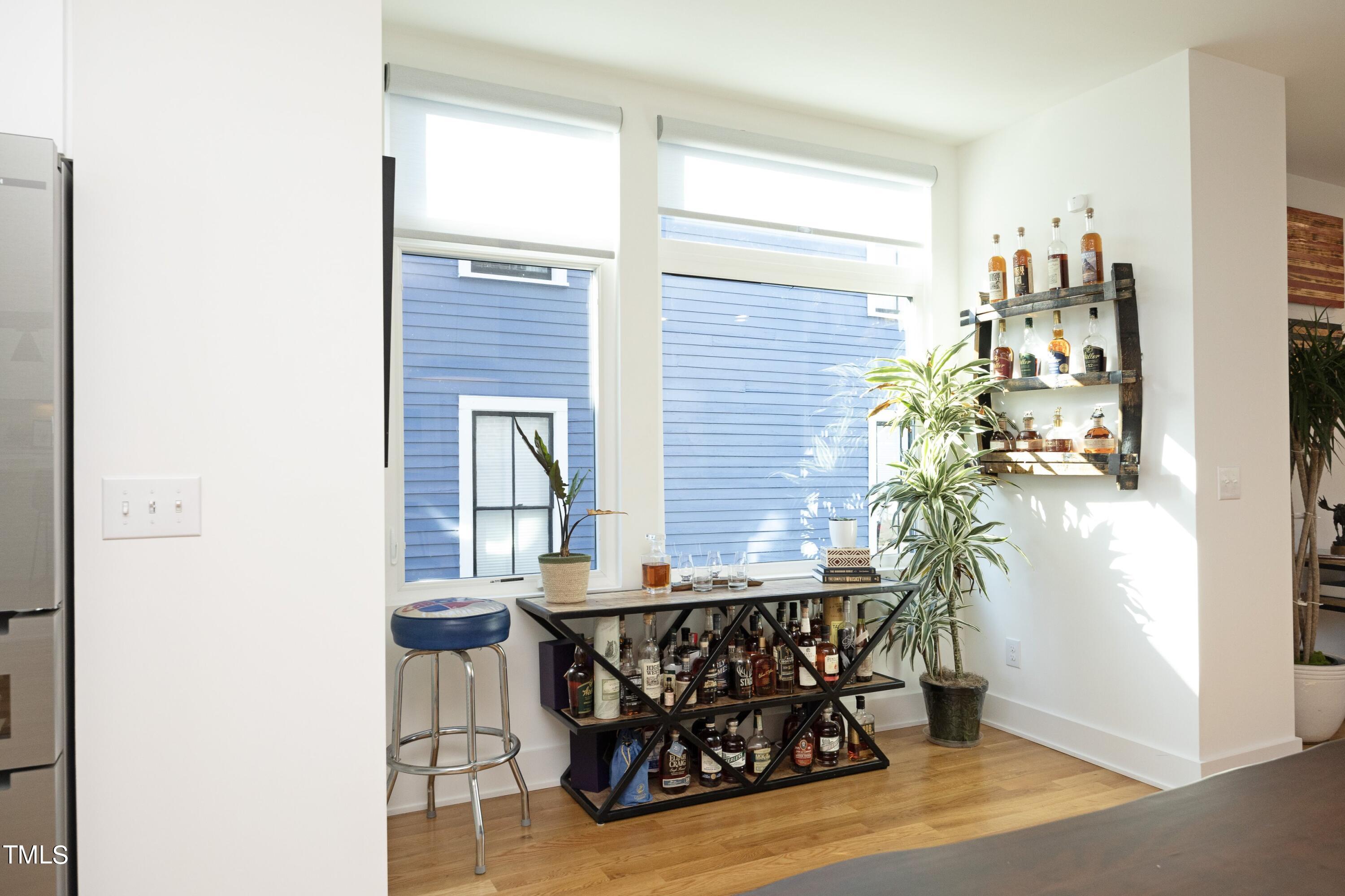 706 East Hargett Street Raleigh, NC 27601 - Photo 8 of 35 a dining room with furniture and wooden floor