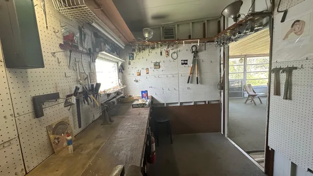 a view of a house with backyard