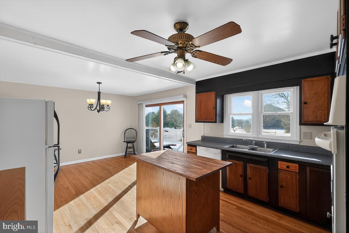 224 Blake Road Elkton, MD 21921 - Photo 14 of 55 a kitchen with granite countertop a sink a counter top space and stainless steel appliances