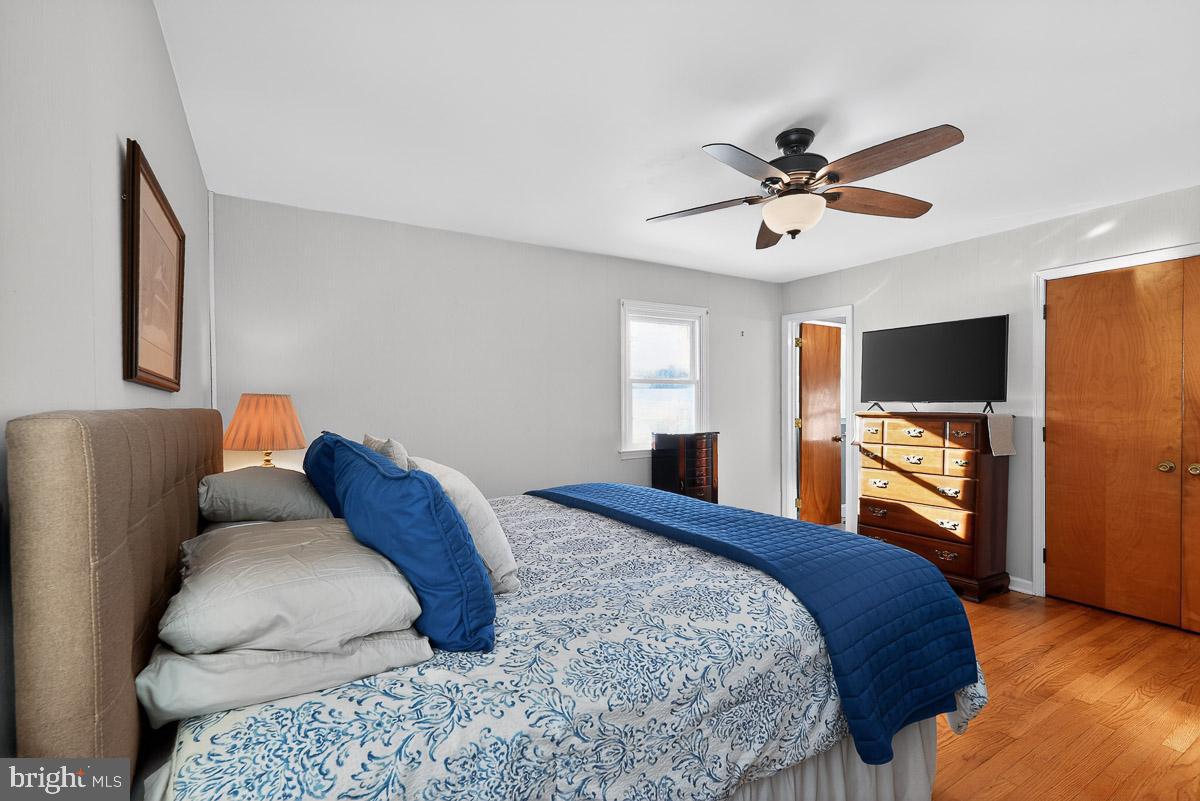 224 Blake Road Elkton, MD 21921 - Photo 18 of 55 a bedroom with a bed and flat screen tv