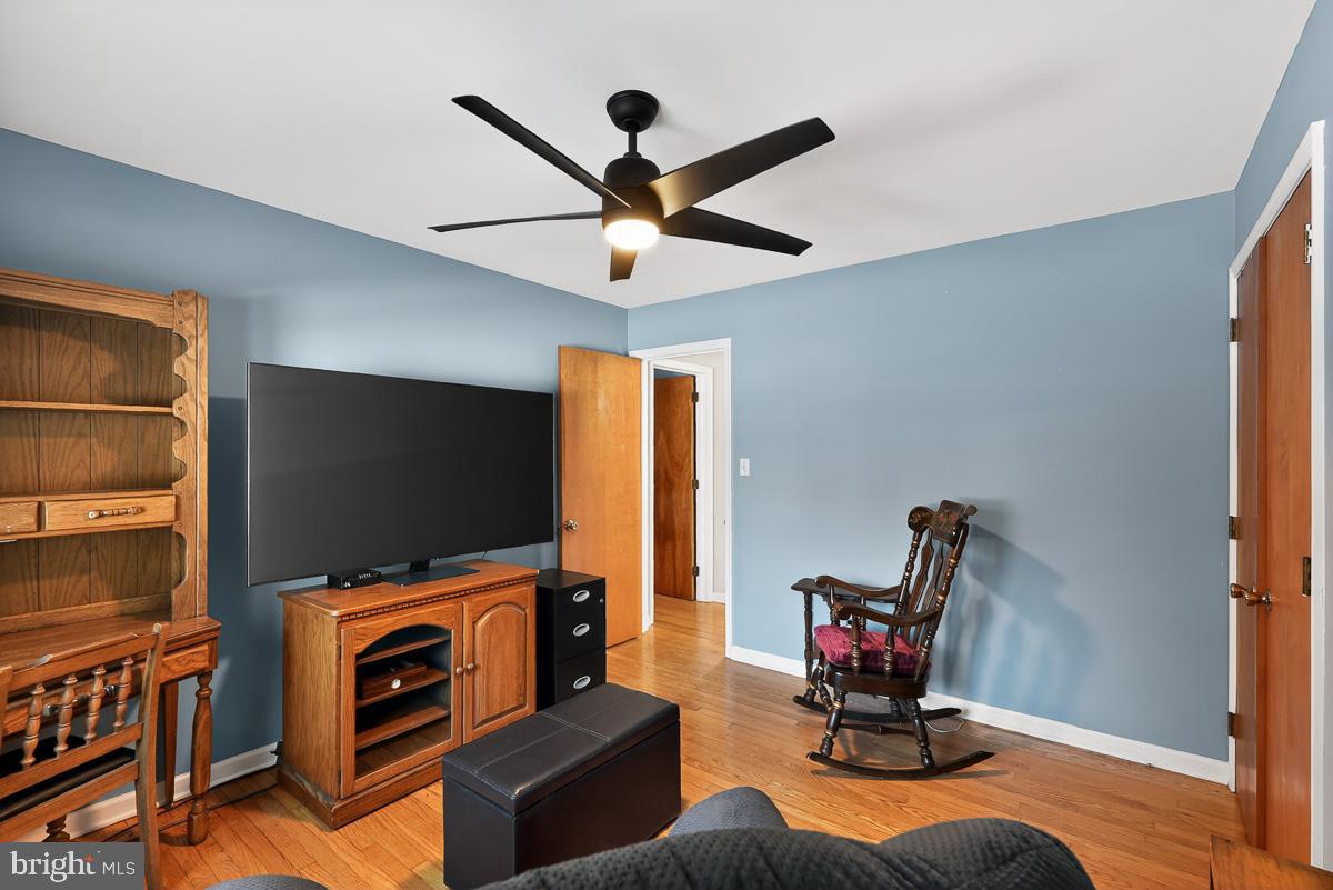 224 Blake Road Elkton, MD 21921 - Photo 20 of 55 a living room with furniture and a flat screen tv