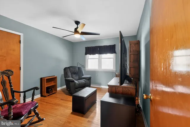 a bathroom with a toilet a sink and garden