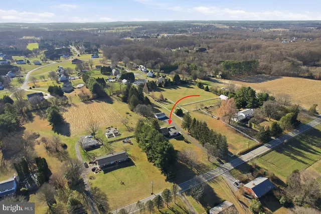 an aerial view of residential building with parking space