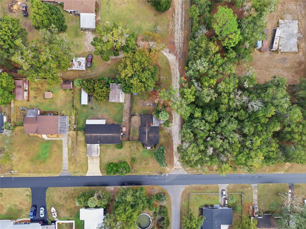 5403 East Tangelo Lane Inverness, FL 34453 - Photo 26 of 32 an aerial view of a house with swimming pool
