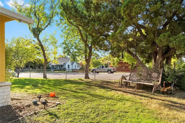 a view of a swimming pool with a bench