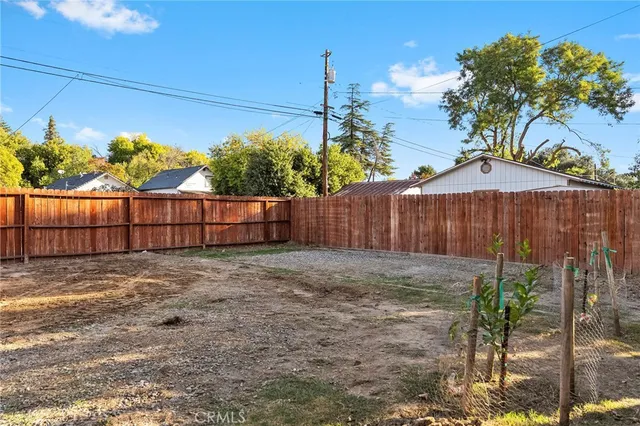 a view of a backyard with plants