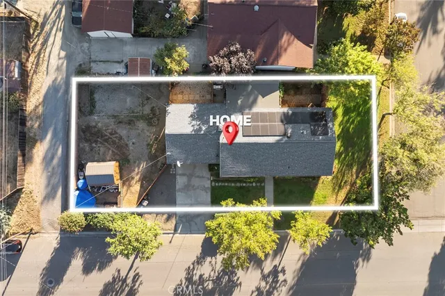 an aerial view of residential building with outdoor space