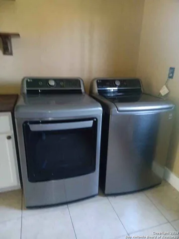 a stove top oven sitting inside of a kitchen