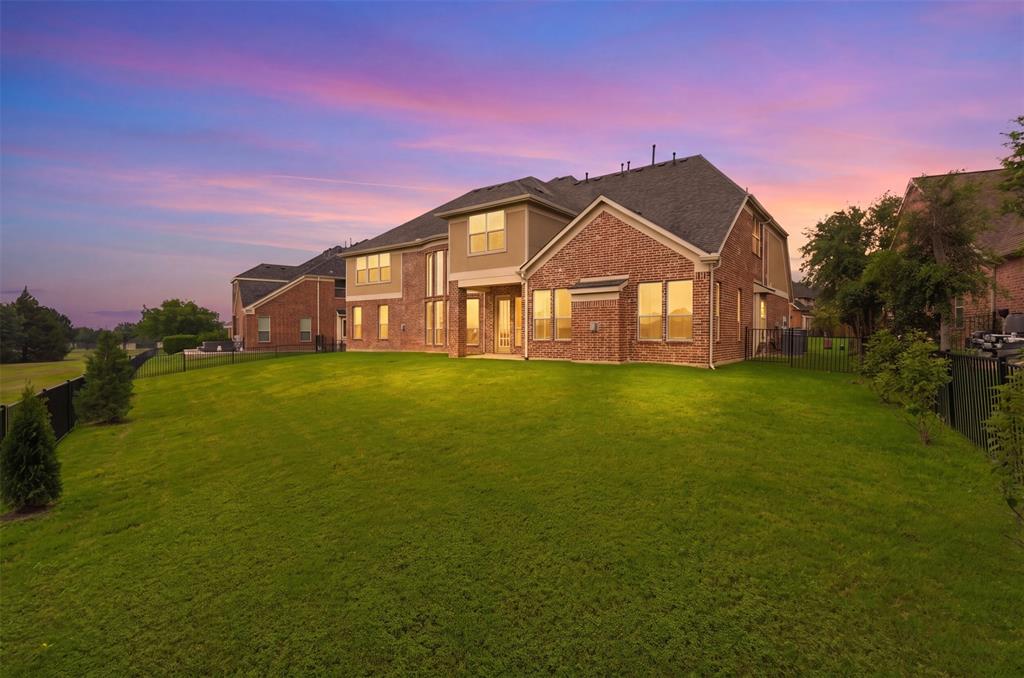 2841 Meadow Ridge Drive Prosper, TX 75078 - Photo 36 of 40 a big house with a big yard and large trees