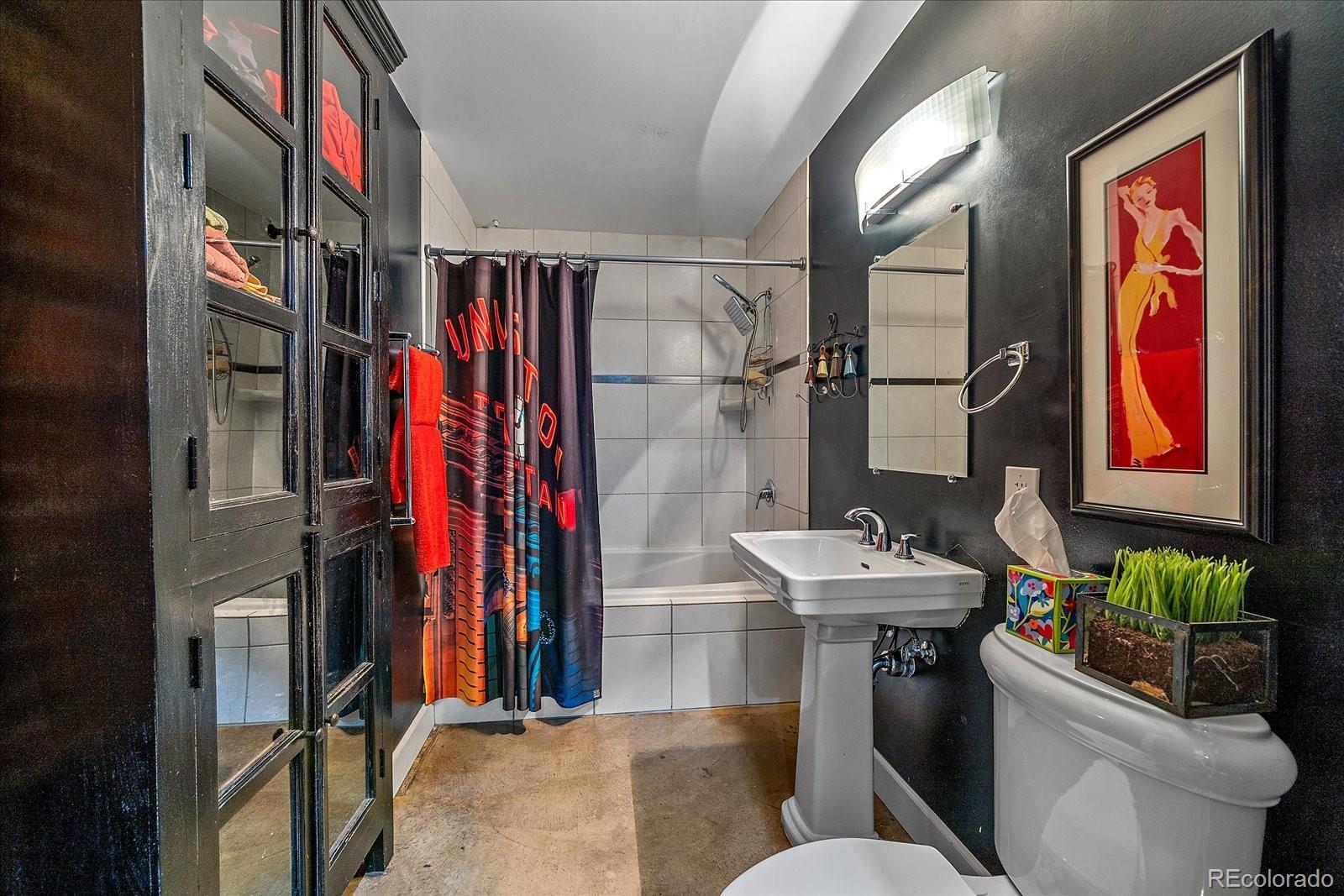 2500 Walnut Street, Unit 202 Denver, CO 80205 - Photo 24 of 31 a bathroom with a sink toilet and shower