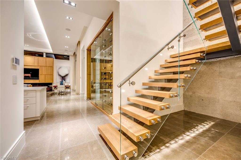 2175 Crayton Road Naples, FL 34103 - Photo 22 of 34 a view of kitchen with furniture and staircase