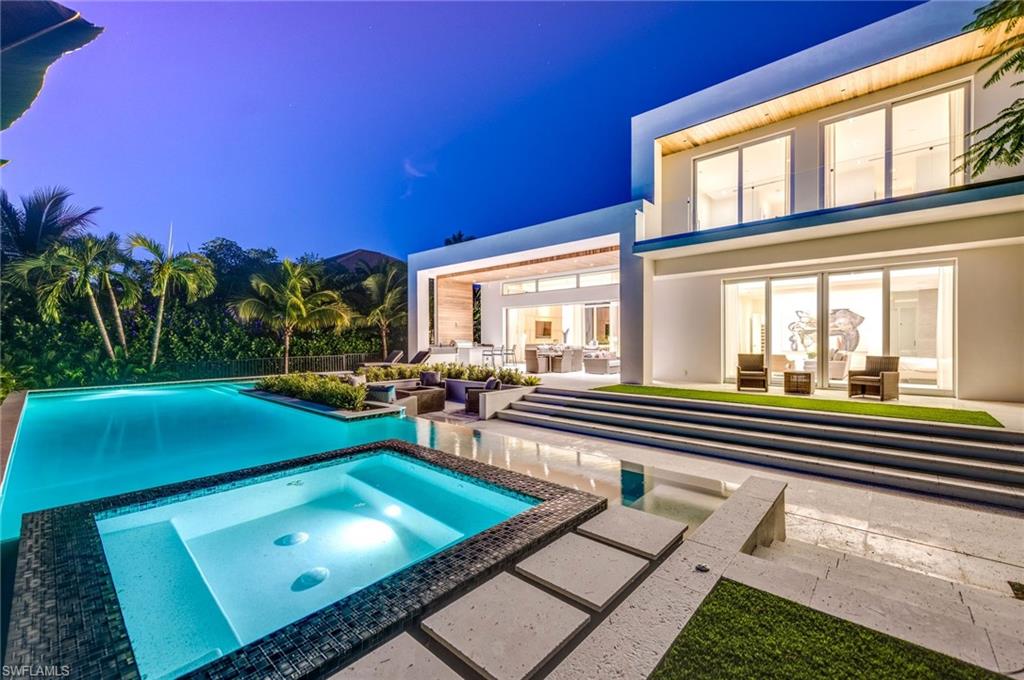 2175 Crayton Road Naples, FL 34103 - Photo 7 of 34 a view of an outdoor space with seating area