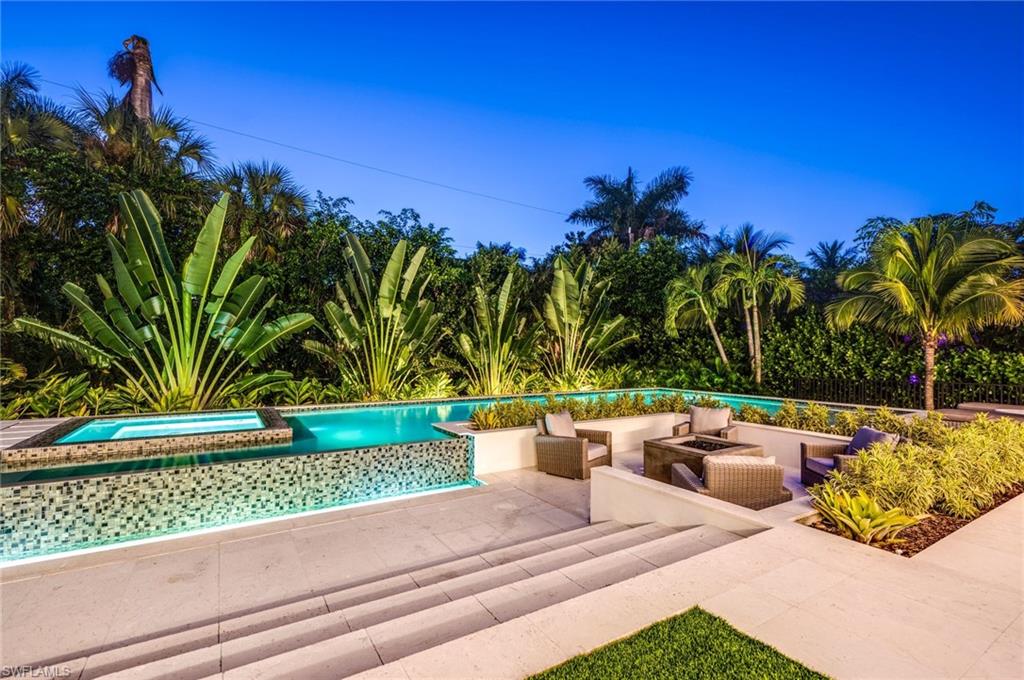 2175 Crayton Road Naples, FL 34103 - Photo 9 of 34 a outdoor view with a seating space