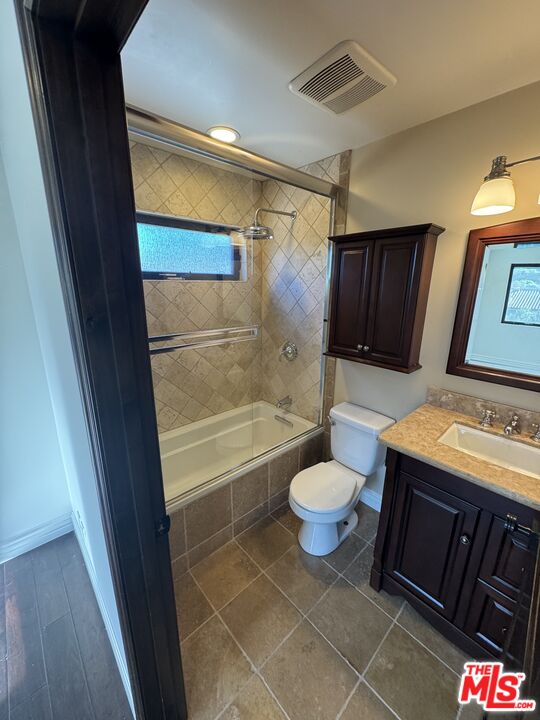 5515 Ruthwood Drive Calabasas, CA 91302 - Photo 36 of 48 a bathroom with a sink a toilet and shower