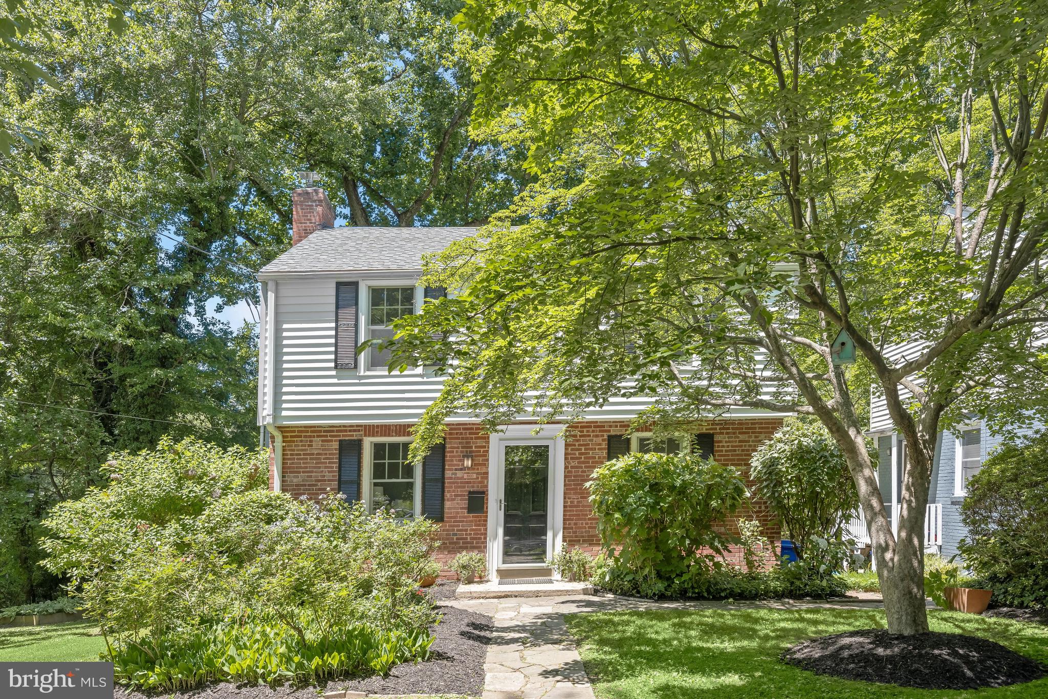 8800 Maywood Avenue Silver Spring, MD 20910 - Photo 1 of 41 front view of a house with a garden