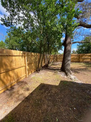 a view of a backyard of a house