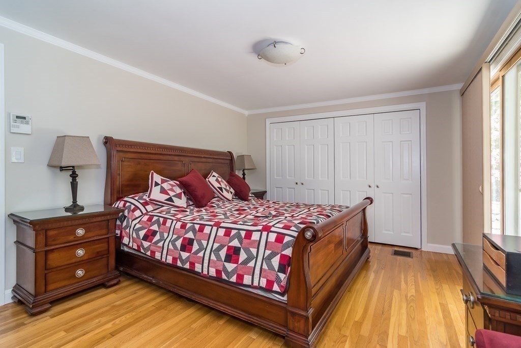 10 Winch Way Natick, MA 01760 - Photo 16 of 34 a bedroom with a bed and a window