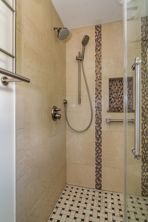 10 Winch Way Natick, MA 01760 - Photo 20 of 34 a bathroom with a shower