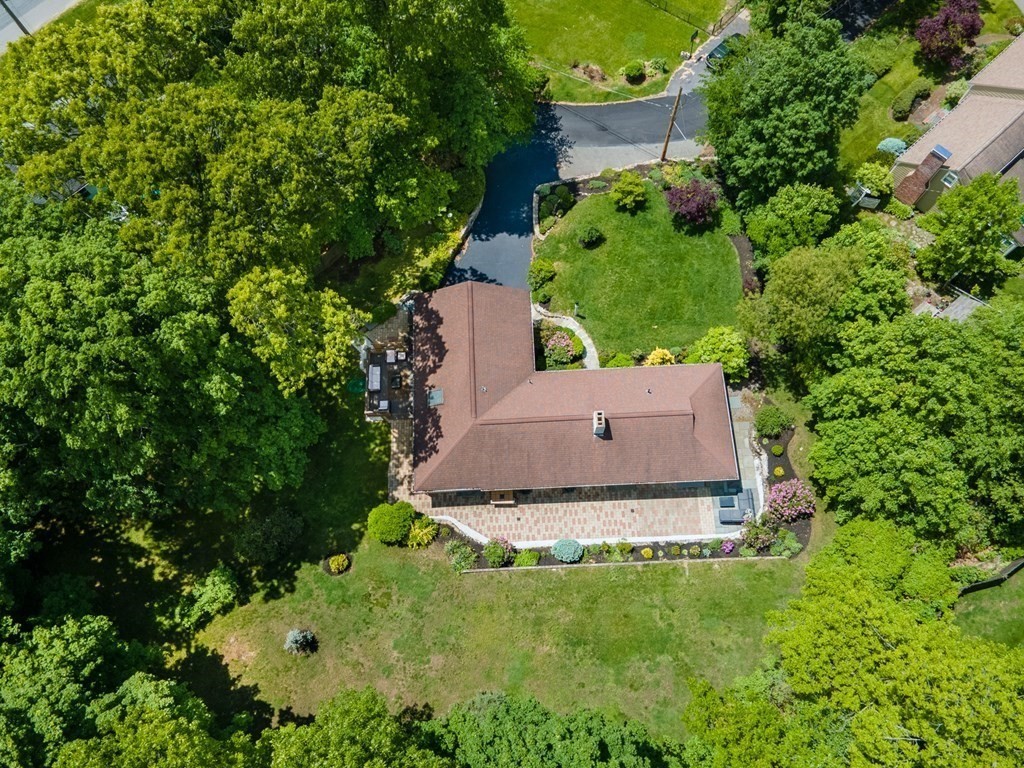 10 Winch Way Natick, MA 01760 - Photo 3 of 34 an aerial view of a house with yard and trees all around