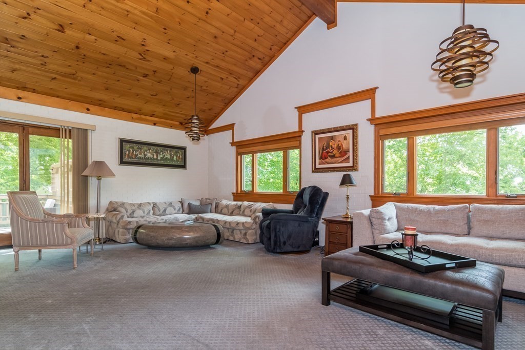 10 Winch Way Natick, MA 01760 - Photo 4 of 34 a living room with furniture and a large window