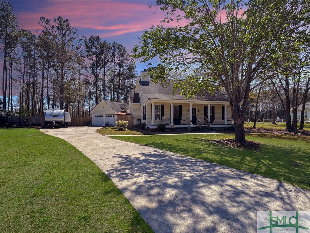 129 Linton Lane Guyton, GA 31312 - Photo 1 of 21 Southern style home with porch, big back yard, She