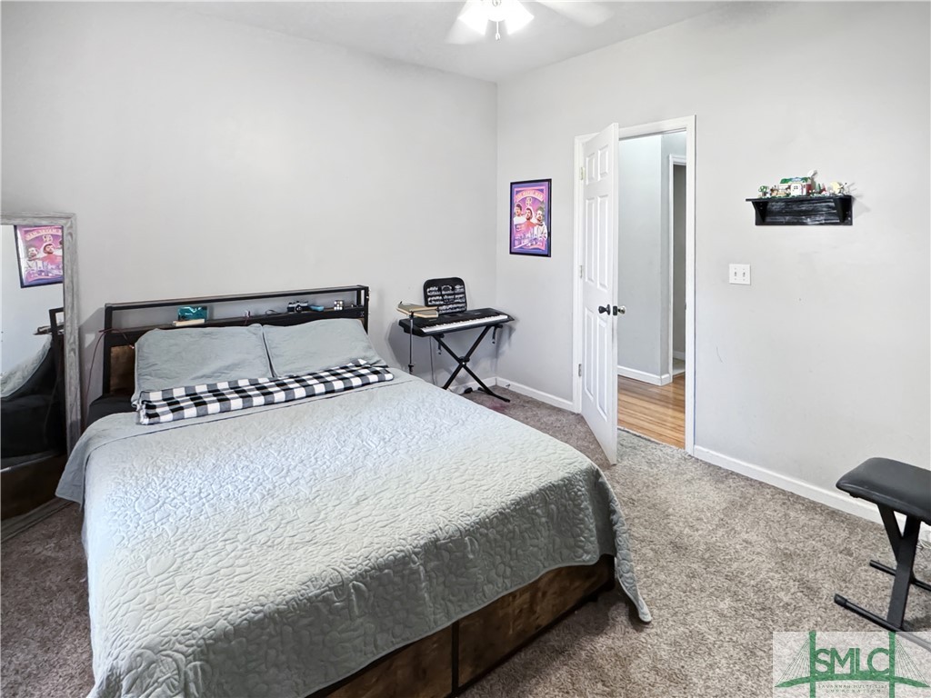 129 Linton Lane Guyton, GA 31312 - Photo 11 of 21 Bedroom 3 overlooks Front Porch