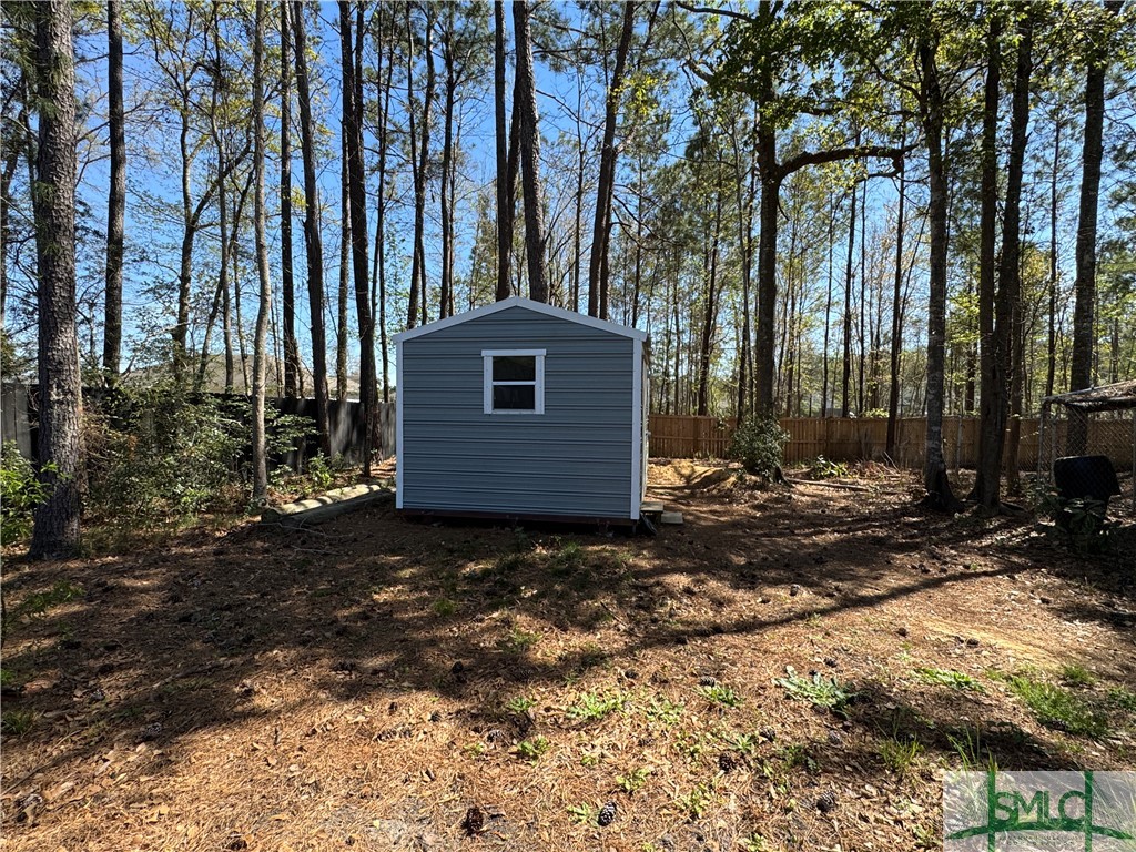 129 Linton Lane Guyton, GA 31312 - Photo 16 of 21 She Shed/Wife's Office enjoys quite a space, AC an