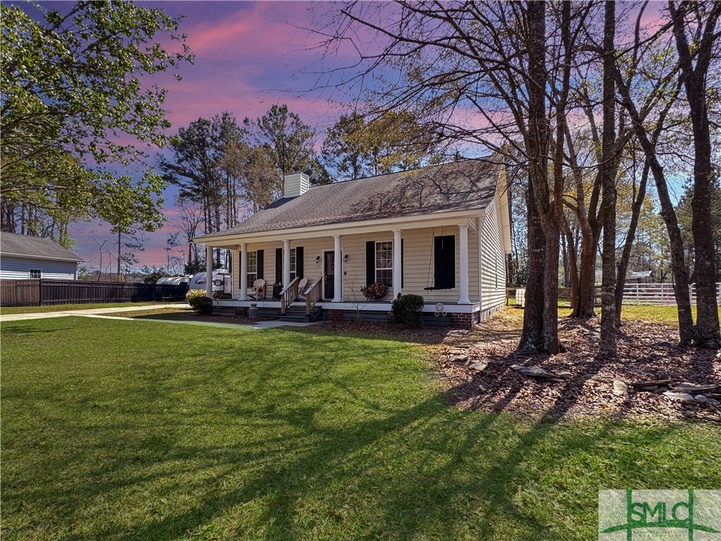 129 Linton Lane Guyton, GA 31312 - Photo 21 of 21 View of the right side of the home from the street