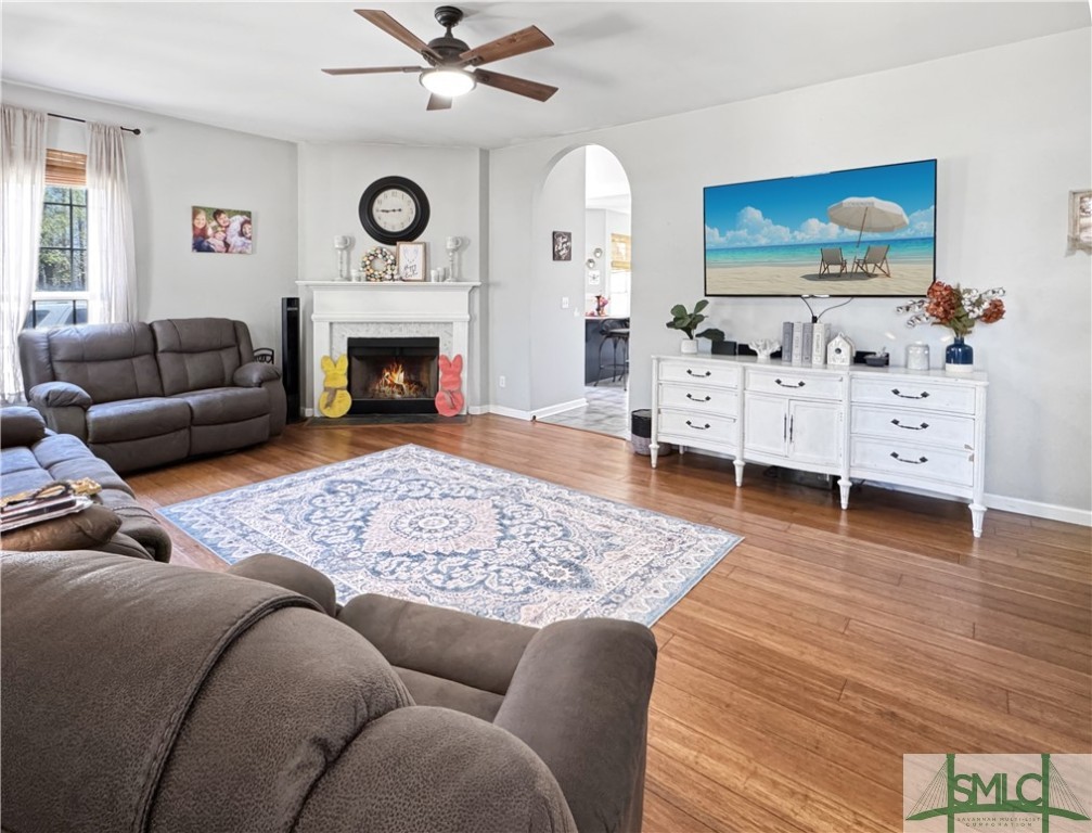 129 Linton Lane Guyton, GA 31312 - Photo 5 of 21 Wood-Burning Fireplace anchors the Great Room