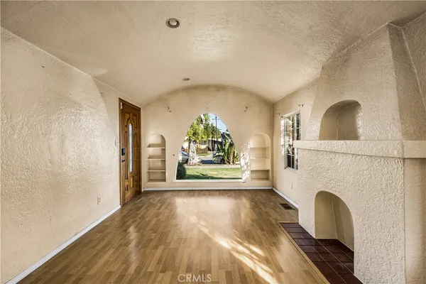 a view of a fireplace in a hallway