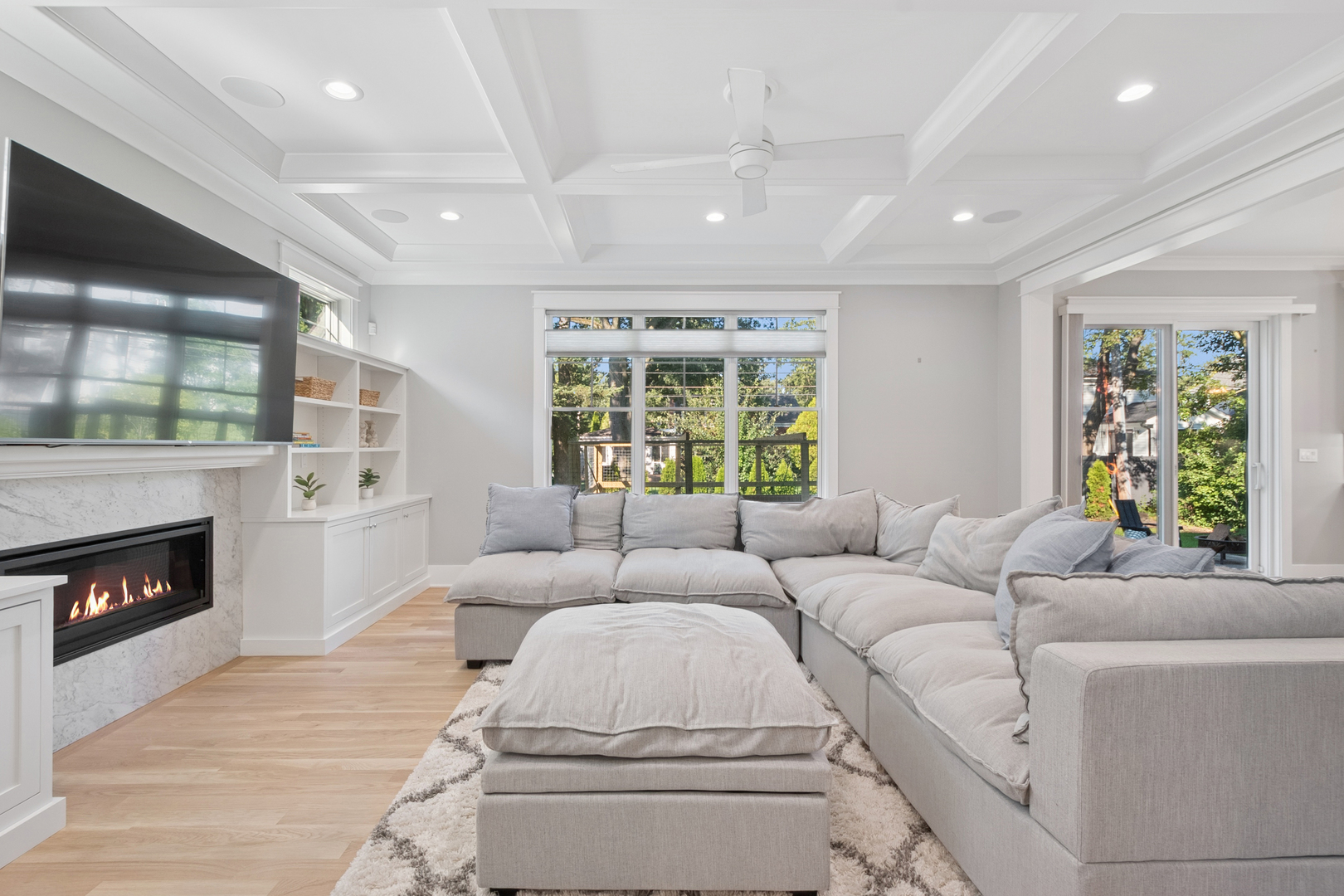 928 Hunter Road Glenview, IL 60025 - Photo 16 of 40 a living room with furniture and a fireplace