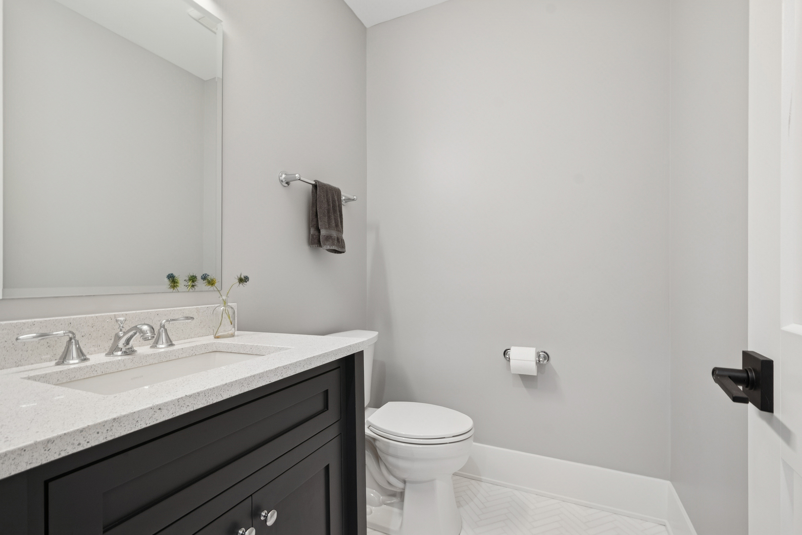 928 Hunter Road Glenview, IL 60025 - Photo 18 of 40 a bathroom with a sink and a toilet